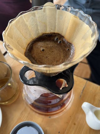 Coffee being brewed with a phin filter